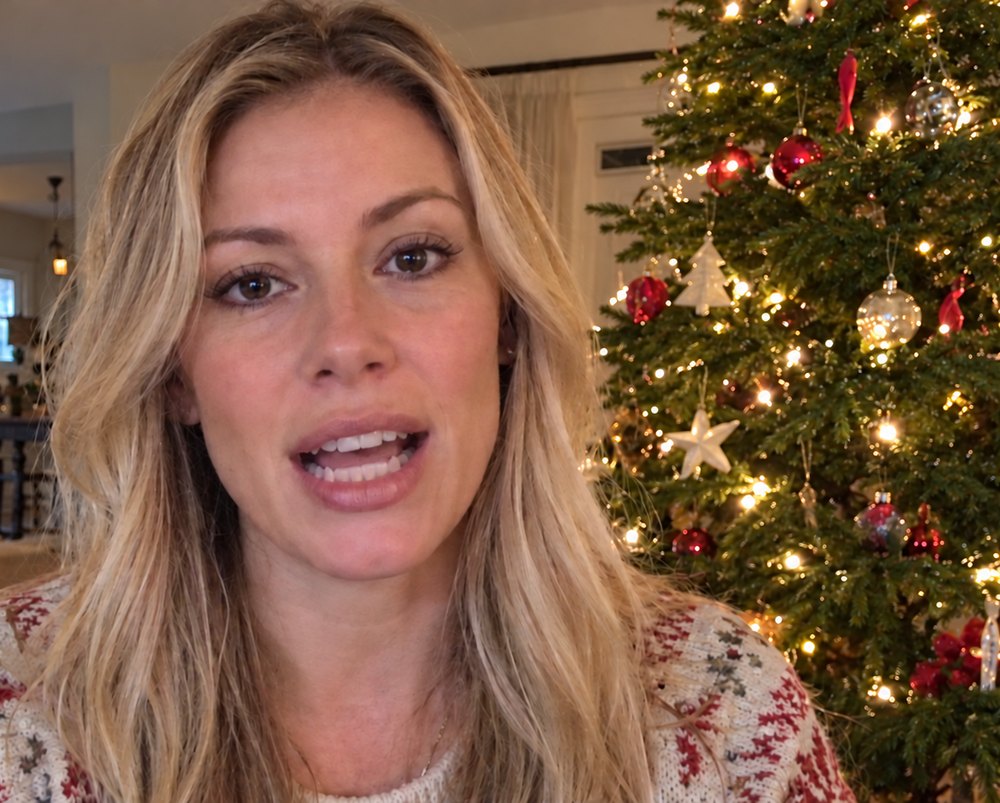 Emily Hart in her living room by her Christmas tree